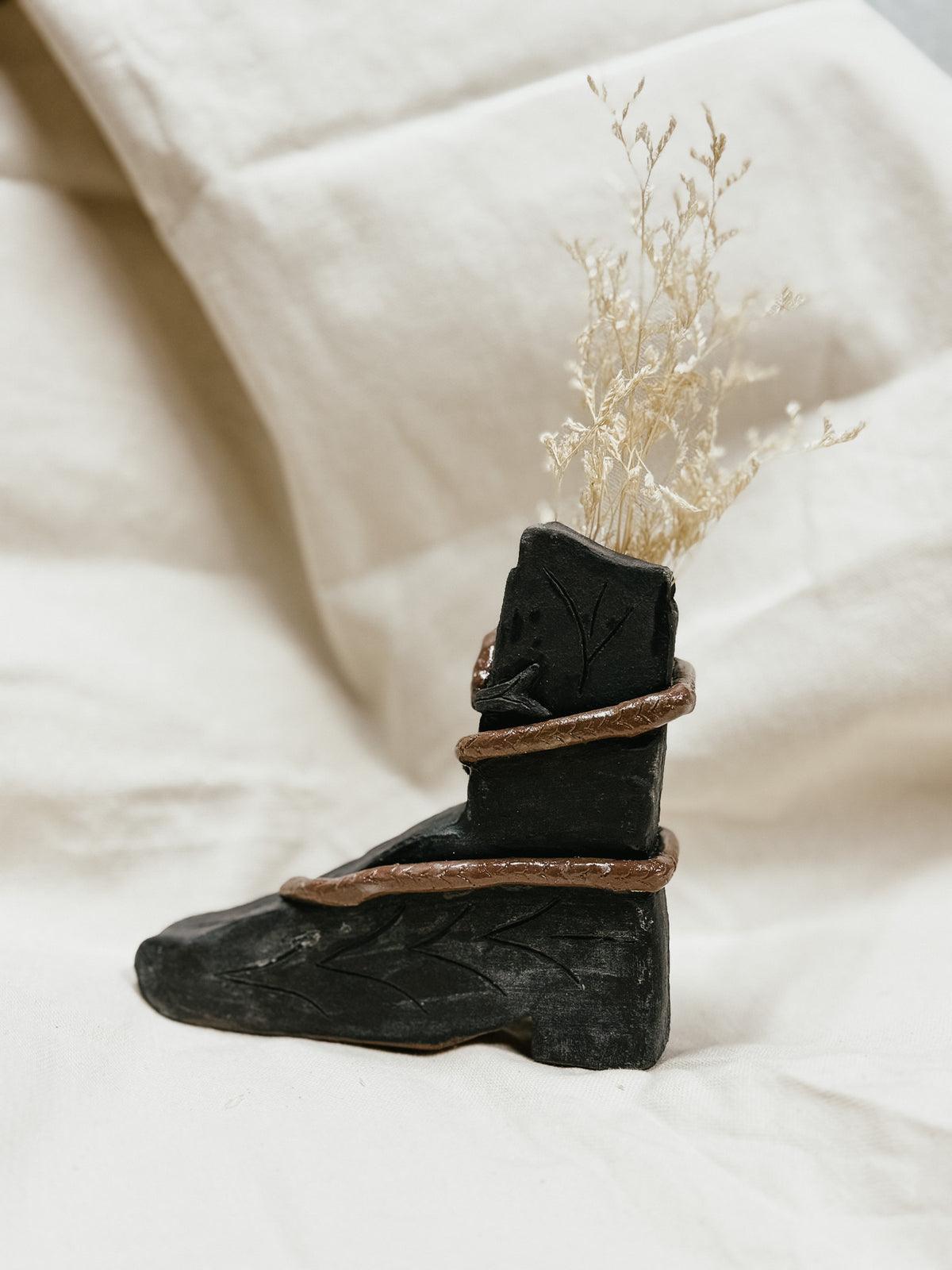 LANIAKEA STUDIO | FLORERO BOTA