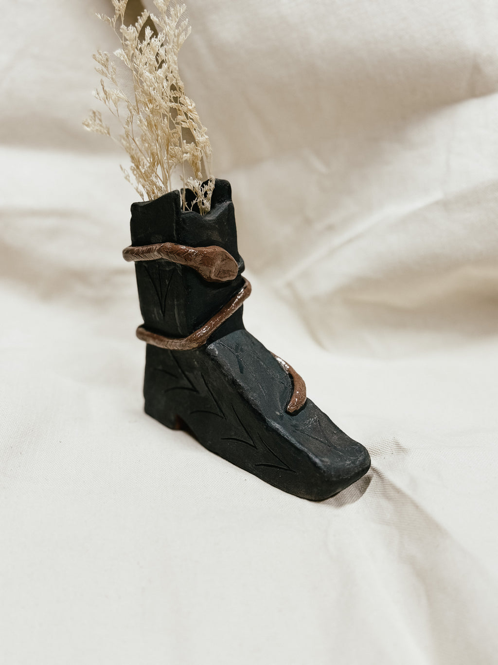 LANIAKEA STUDIO | FLORERO BOTA