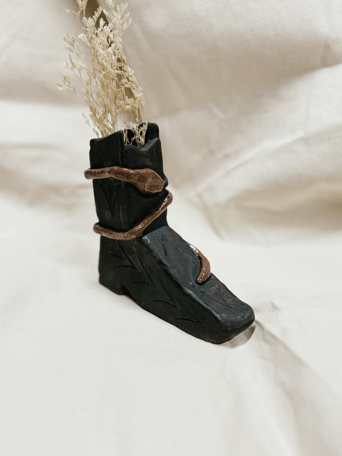 LANIAKEA STUDIO | FLORERO BOTA