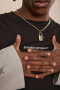 BOMBA | COLLAR PLATEADO - HANDLE WITH CARE