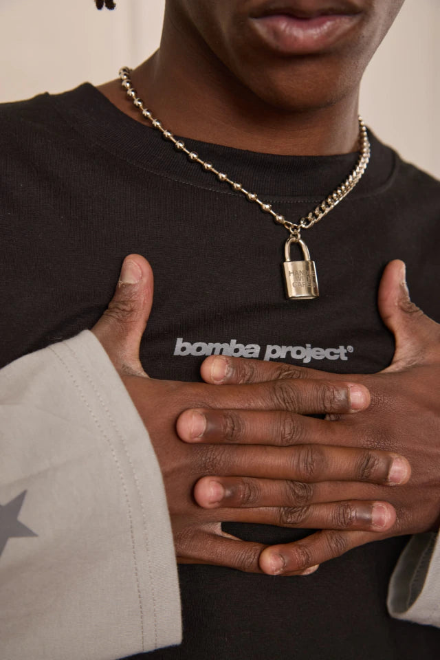 BOMBA | COLLAR PLATEADO - HANDLE WITH CARE